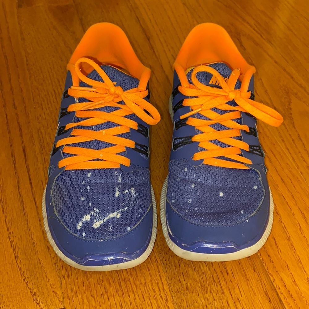 Blue and orange Nikes